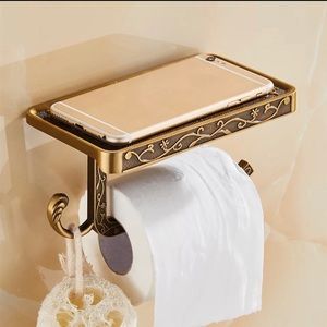 Vintage style toilet paper holder with shelf.